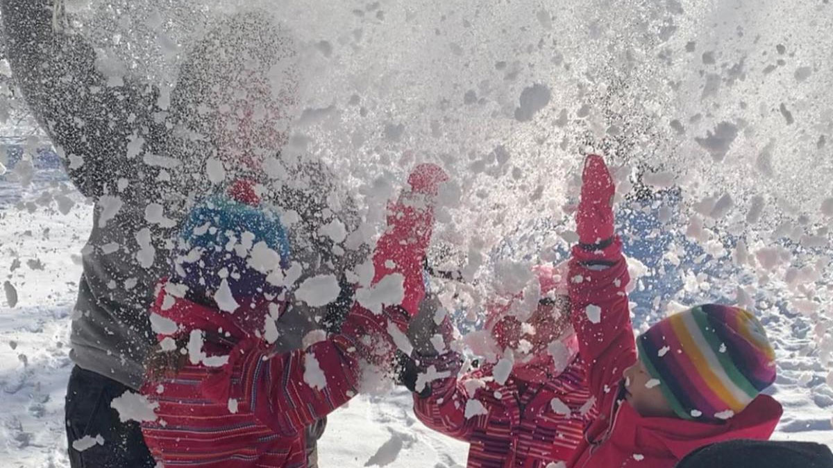 Kids playing with snow at Turn Back Time